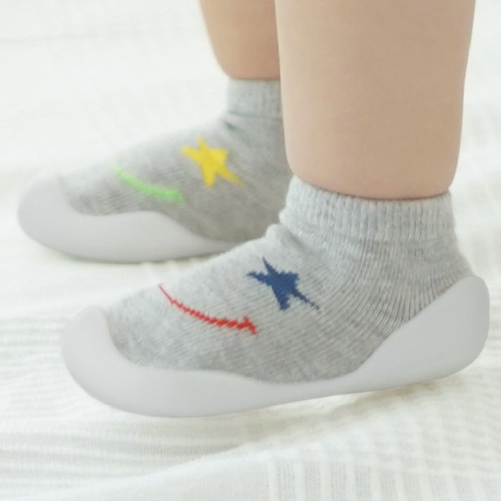 Smile Baby First Walking Shoes: Elastic baby shoes with honeycomb outsole for slip resistance. Gentle flex for delicate baby foot cartilage, lightweight design for growth and learning to walk.