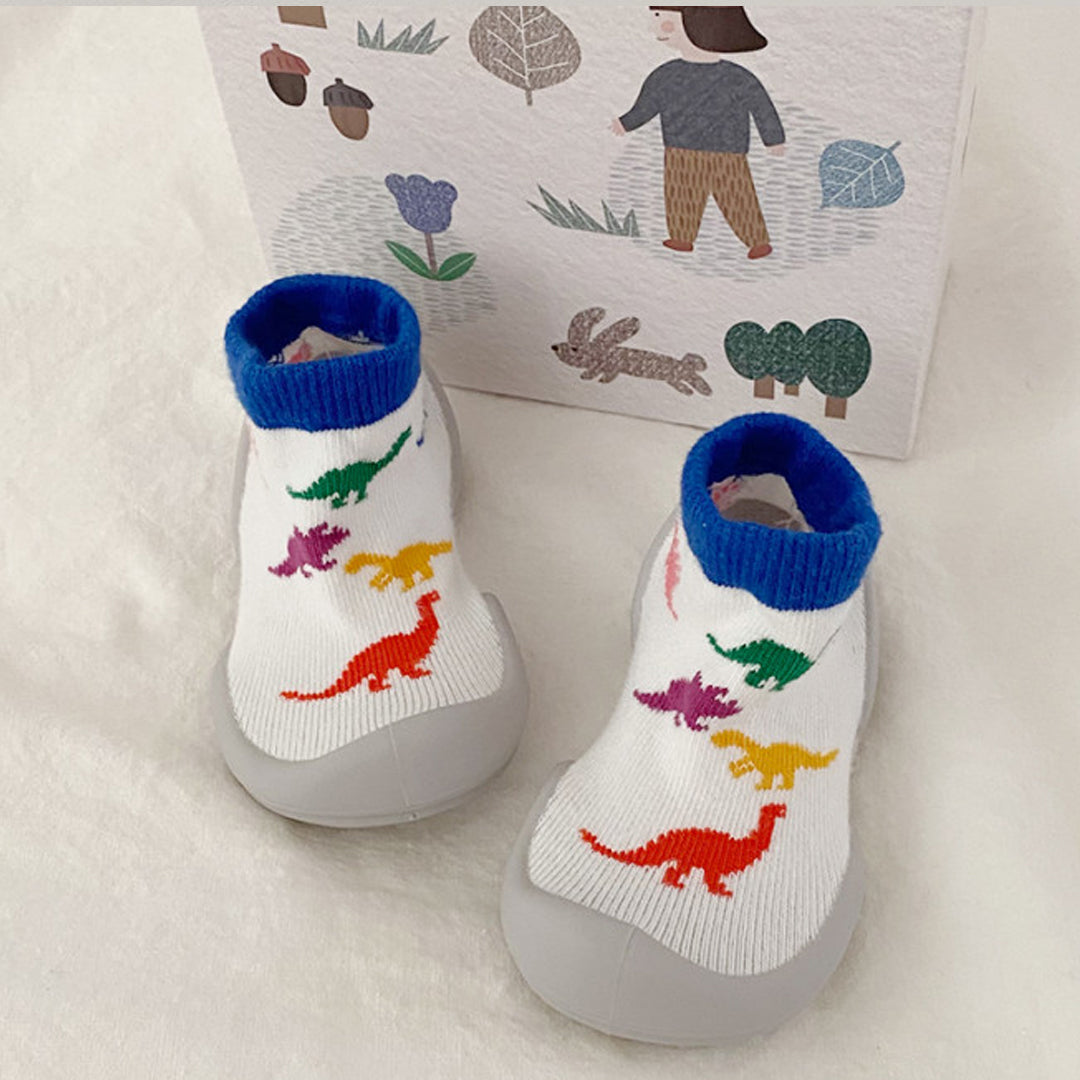 Jurassic Baby First Walking Shoes: Comfortable, elastic baby shoes with honeycomb outsole for superior slip resistance. Gentle flex for delicate baby foot cartilage, promoting growth and learning to walk.